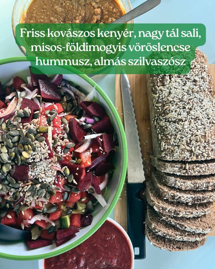 Friss kovászos kenyér, nagy tál sali, misos-földimogyis vöröslencse hummusz, almás szilvaszósz